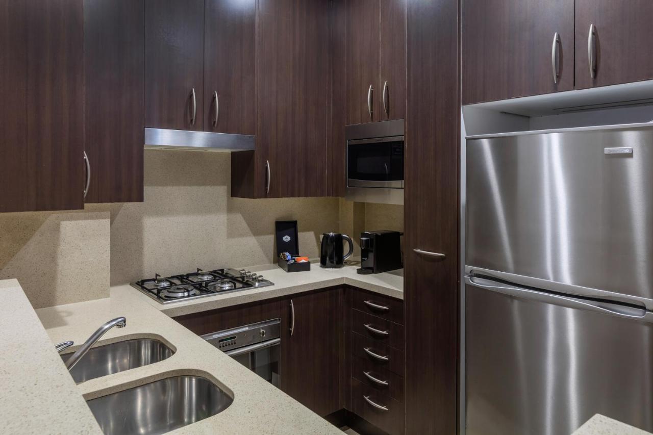 Meriton Suites Pitt Street, Сидней Экстерьер фото A typical kitchen in a serviced apartment